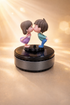Acto Solar Powered Rotating Kissing KS01 Couple Showpiece with Aroma Diffuser Bottle – Romantic Dashboard & Home Decor