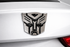 Carsonify 3D Metal Transformer Car Badge Emblem Sticker | Aluminum Alloy Chrome Autobot Logo Decal | Self-Adhesive Car & Bike Exterior Decoration | Premium Metallic Auto Styling