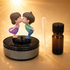 Acto Solar Powered Rotating Kissing KS01 Couple Showpiece with Aroma Diffuser Bottle – Romantic Dashboard & Home Decor