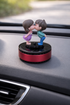 Acto Solar Powered Rotating Kissing KS01 Couple Showpiece with Aroma Diffuser Bottle – Romantic Dashboard & Home Decor