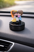 Acto Solar Powered Rotating Kissing KS03 Couple Showpiece with Aroma Diffuser Bottle – Romantic Dashboard & Home Decor