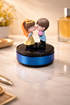 Acto Solar Powered Rotating Kissing KS03 Couple Showpiece with Aroma Diffuser Bottle – Romantic Dashboard & Home Decor